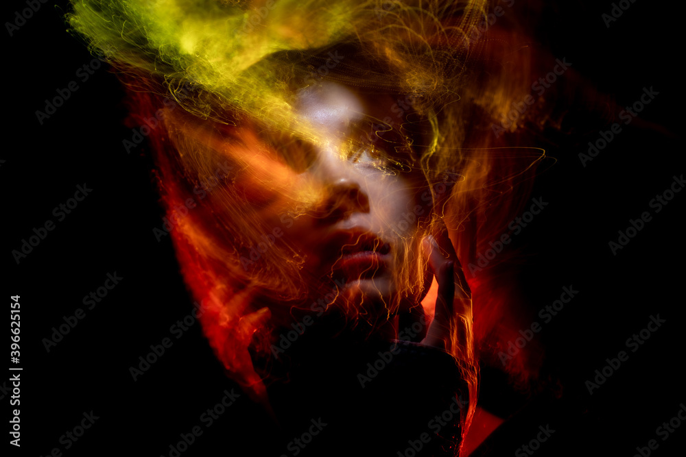 Fototapeta premium lightpainting portrait, new art direction, long exposure photo without photoshop, light drawing at long exposure