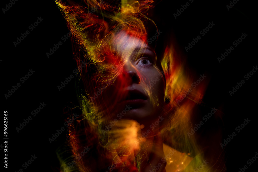 Fototapeta premium lightpainting portrait, new art direction, long exposure photo without photoshop, light drawing at long exposure
