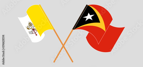 Crossed flags of Vatican and East Timor