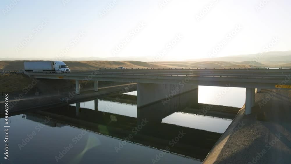 Farmland Irrigation Traffic on Highway I5 Interstate farmland mountains sunset Farmland Irrigation Traffic on Highway I5 Interstate farmland mountains sunset