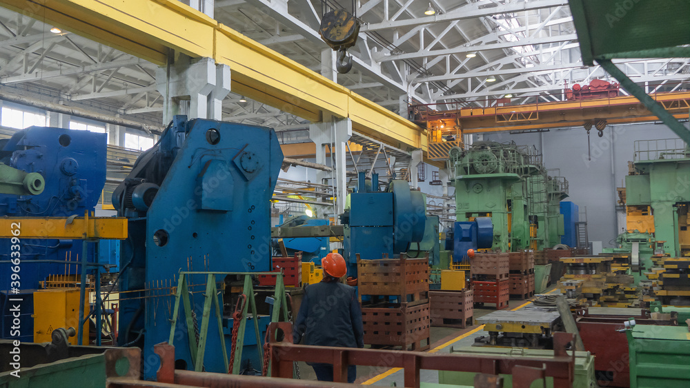 Overhead crane or bridge crane include hoist lifting for transportation, manufacturing, and production. Factory warehouse overhead crane lifts the load, Industry concept.
