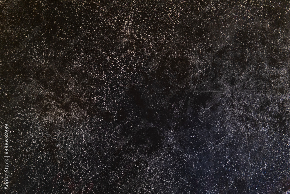 textured background from black stone. layout for a banner with a place for an inscription. background in the form of space textured background from black stone. layout for a banner with a place for an inscription. background in the form of space