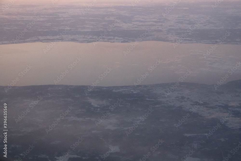 Plane view of foggy morning lake 