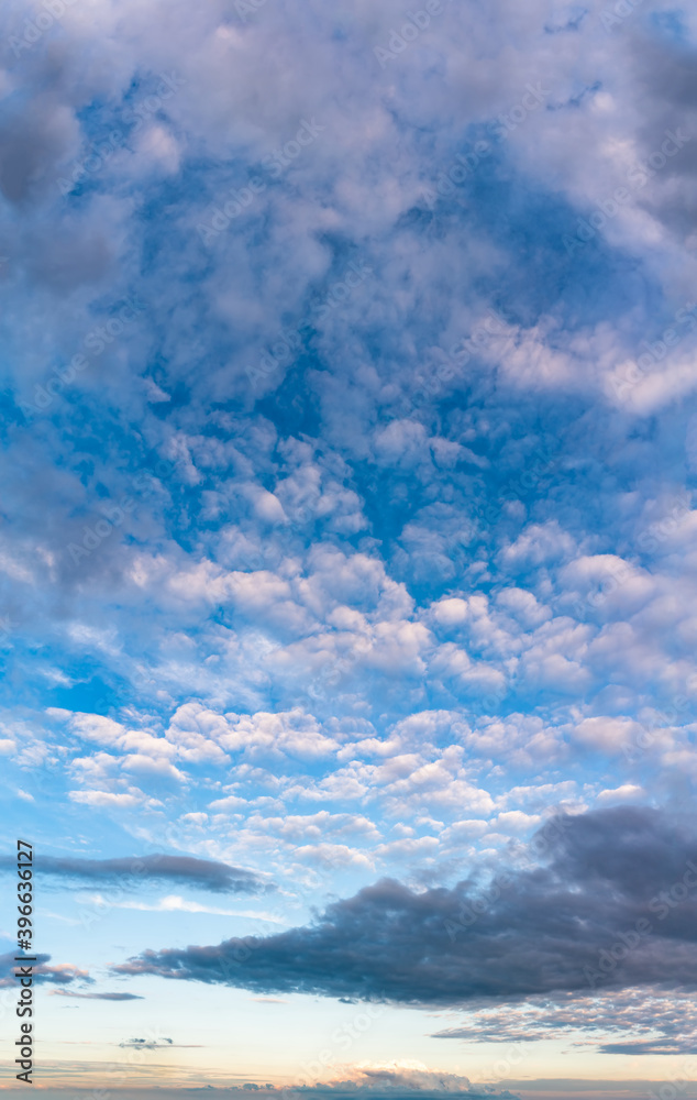 Fantastic clouds at sunrise, vertical panorama Fantastic clouds at sunrise, vertical panorama