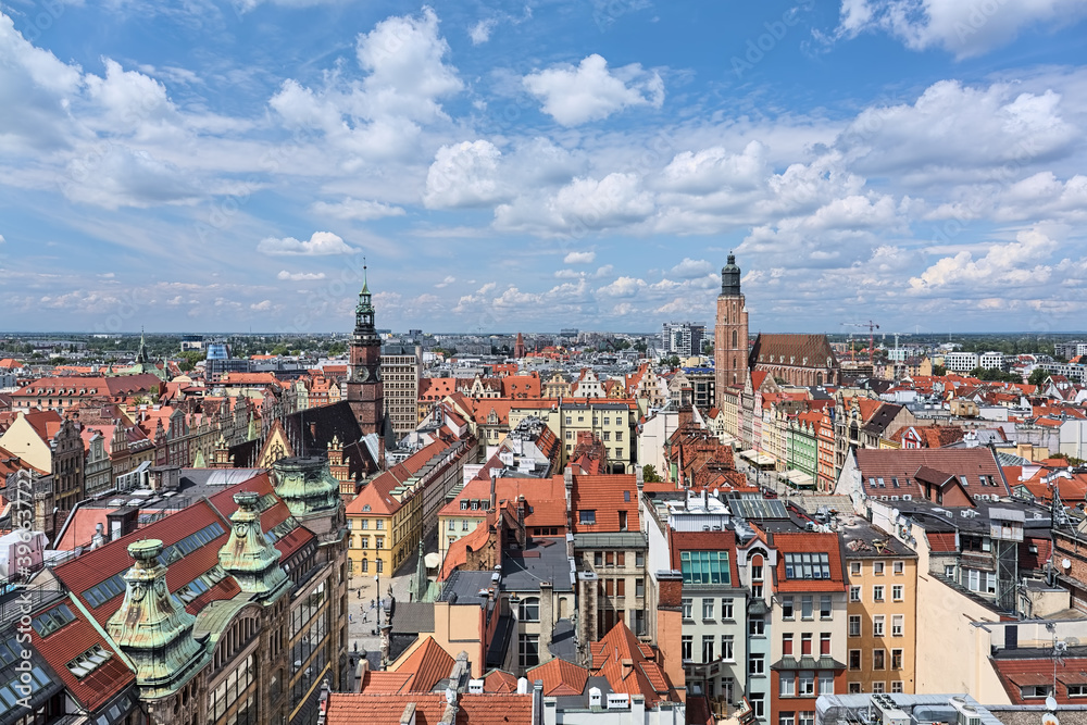 Wroclaw, Poland. High angle view on Market Square with Old Town Hall, St. Elizabeth's Church and western part of the city. View from a bridge between towers of St. Mary Magdalene Church.