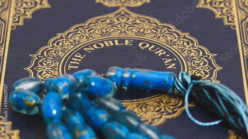 Quran cover with gold islamic pattern photo