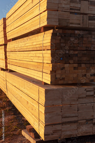 Warehouse for sawing boards in an outdoor sawmill. Wood panels. Concept-Wood industry