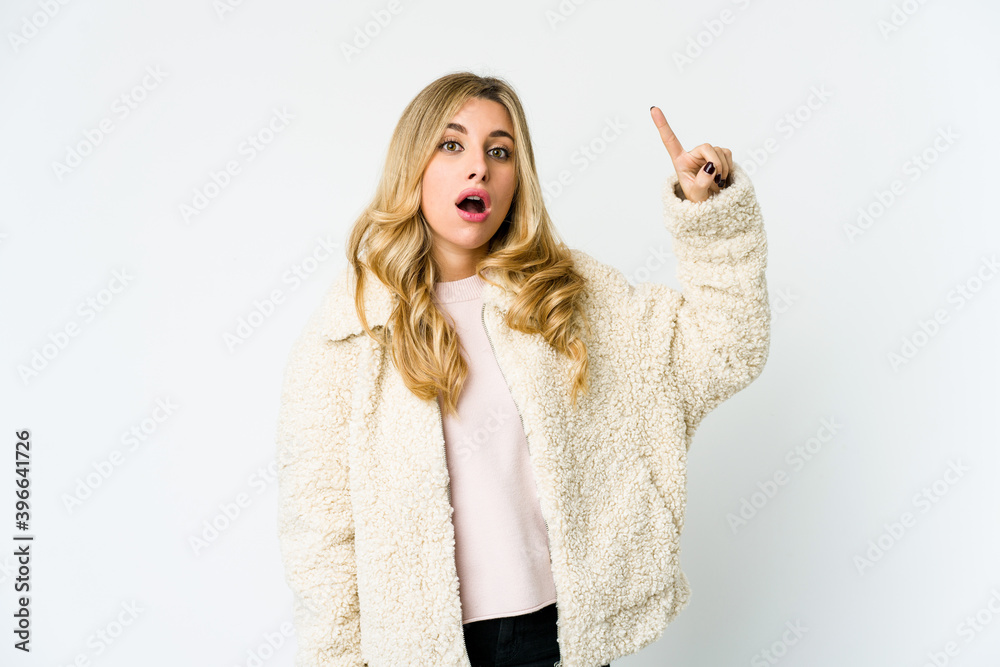 Young caucasian blonde woman having some great idea, concept of creativity. Young caucasian blonde woman having some great idea, concept of creativity.