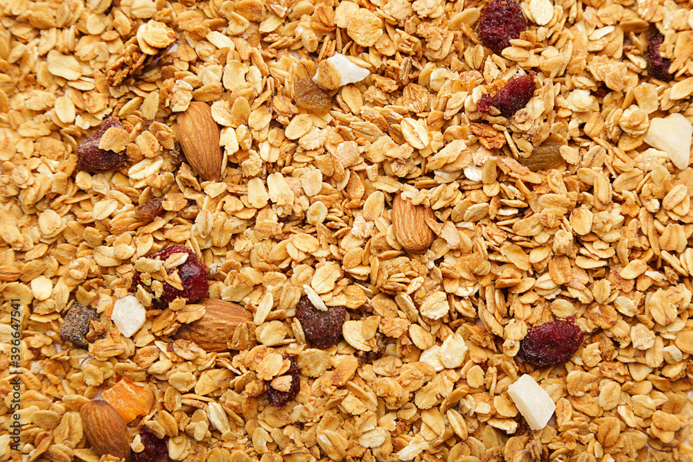 Background of tasty granola with almonds Background of tasty granola with almonds