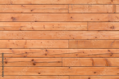 New wooden wall made of pine wood planks, texture