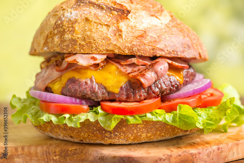 close-up of big hamburger with natural bread