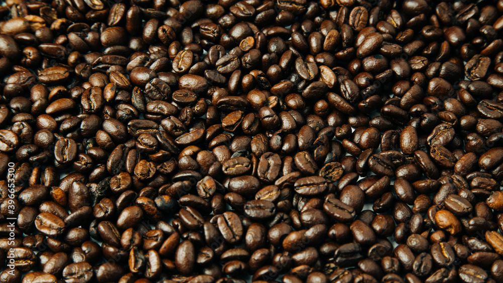 purely Colombian coffee beans in baso and grain