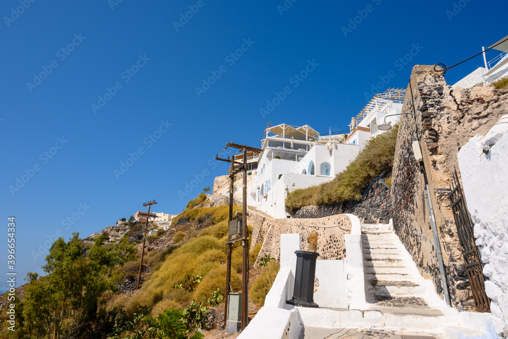 Walkway with stairs in Fira on the Santorini Island. Cyclades, Greece