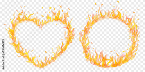 Set of translucent fire flames in the shape of circle and a heart on transparent background. For used on light illustrations. Transparency only in vector format