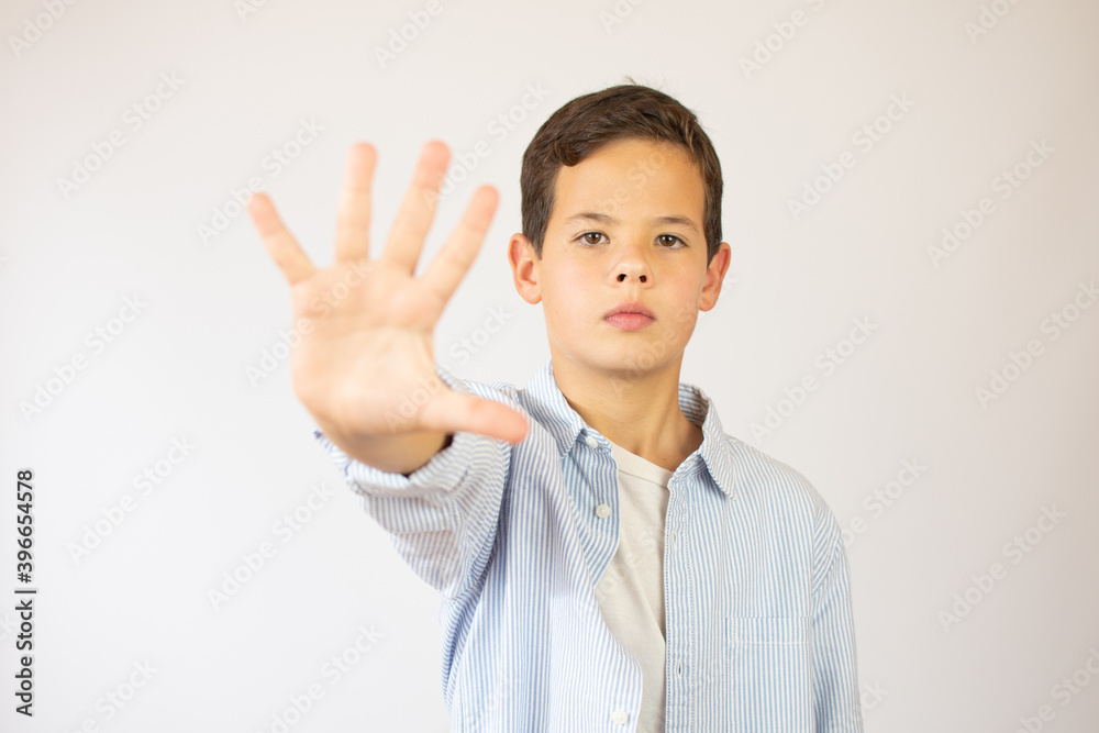 cool young boy showing number five isolated on white background cool young boy showing number five isolated on white background