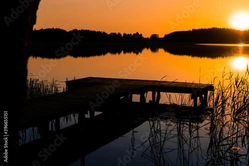 sun over the lake Wigierski National Park photo