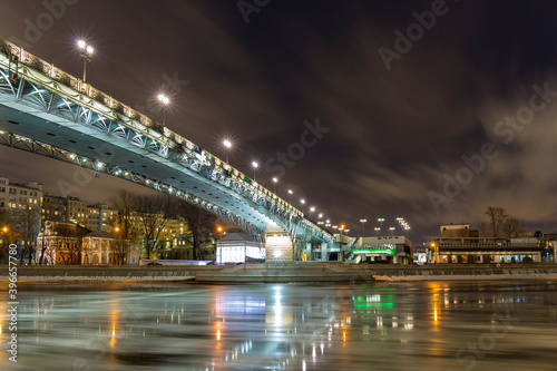 Winter view on Moscow river, citiscape with New Year illumination. © idea_studio