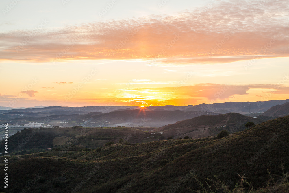 Sunset in mountains. Beautiful colorful sunset view.