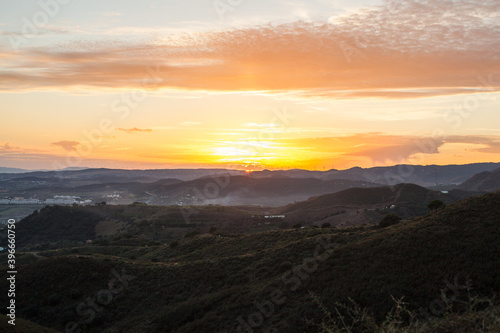 Sunset in mountains. Beautiful colorful sunset view.