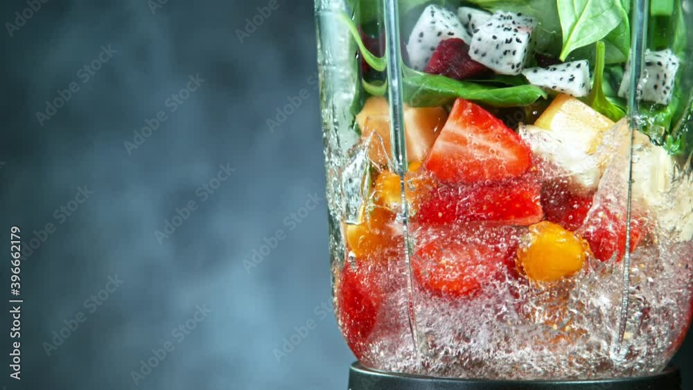 Fresh smoothie blended in blender, side view. Healthy eating concept