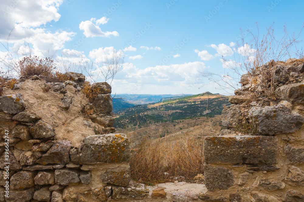 Morella castle ruins, ramparts and fortification. Morella is a beautiful walled city on a rock, Maestrat region, Castellon province, Valencian community, Spain. Morella castle ruins, ramparts and fortification. Morella is a beautiful walled city on a rock, Maestrat region, Castellon province, Valencian community, Spain.