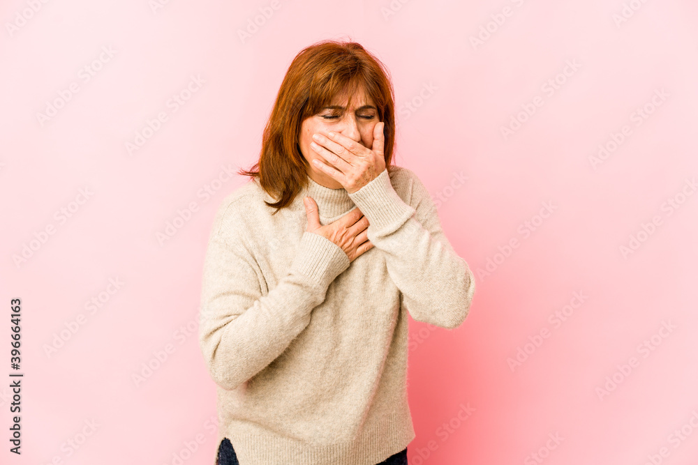 Senior caucasian woman isolated suffers pain in throat due a virus or infection. Senior caucasian woman isolated suffers pain in throat due a virus or infection.