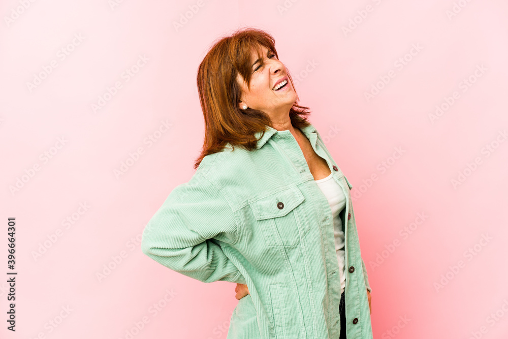 Senior caucasian woman isolated suffering a back pain. Senior caucasian woman isolated suffering a back pain.