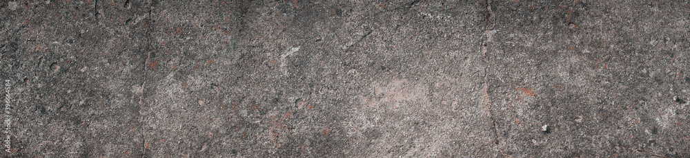 Panoramic view of details of the eroded surface of the old concrete wall. Panoramic view of details of the eroded surface of the old concrete wall.