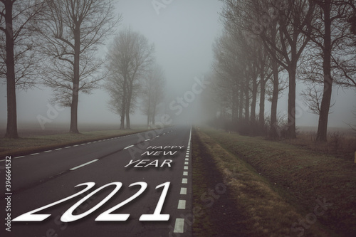 Scary new year 2021, inscription on the road 