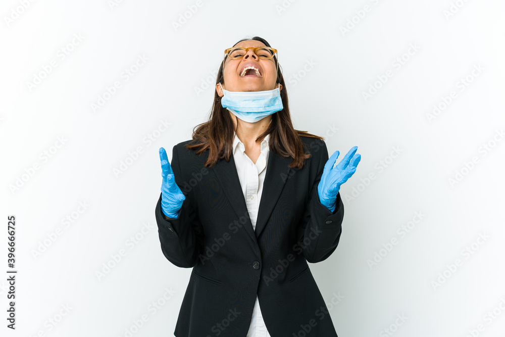 Young business latin woman wearing a mask to protect from covid isolated on white background screaming to the sky, looking up, frustrated. Young business latin woman wearing a mask to protect from covid isolated on white background screaming to the sky, looking up, frustrated.