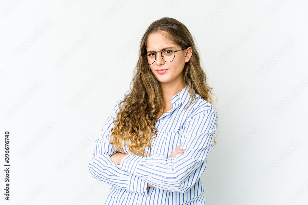 Young caucasian woman suspicious, uncertain, examining you. Young caucasian woman suspicious, uncertain, examining you.