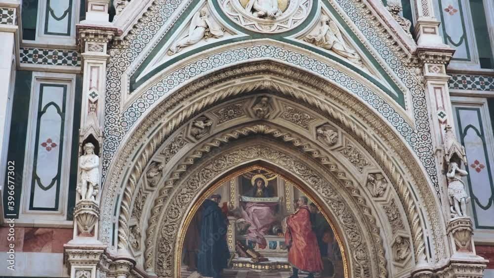 Close up of frescoe of Italian architecture, including Basilica of Santa Croce and Santa Maria del Fiore. Tourism and travel to Italy. Old and ancient building of Florence, painted walls of Cathedral.