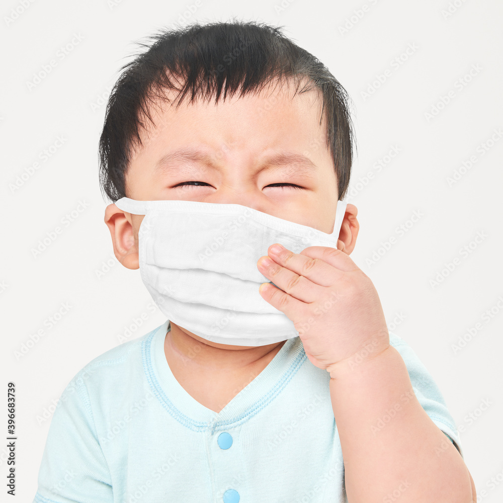 Child wearing face mask in studio Child wearing face mask in studio