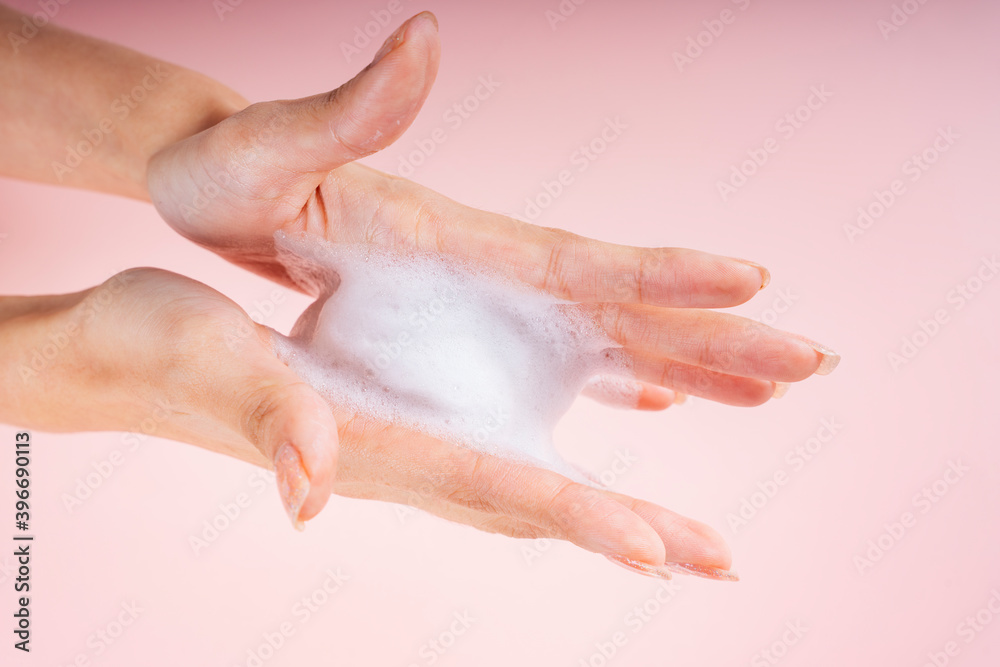 Woman hands with lotion foam. Woman hands with lotion foam.