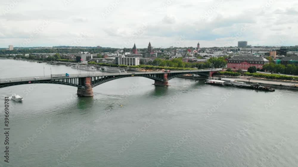 Aerial view towards cars on the Theodor Heuss bridge and the city of Mainz, Germany - approaching, drone shot Aerial view towards cars on the Theodor Heuss bridge and the city of Mainz, Germany - approaching, drone shot