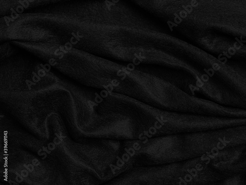 abstract black texture blur background of synthetic fabric fiber with shadow curved line a high resolution closeup of cloth surface or art and design