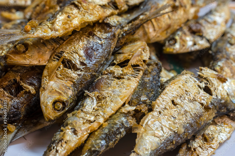 Closeup of deep fried sardines, locally known as Salinyasi. It is a