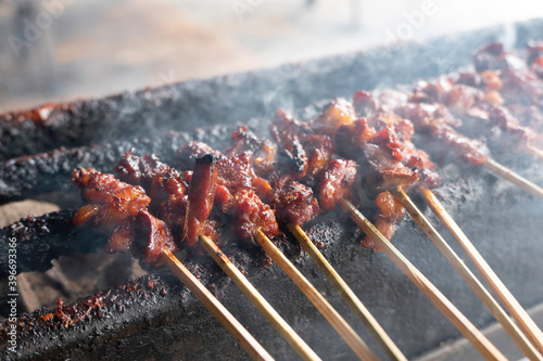 One of the typically Indonesian foods is satay or sate. This food is made from beef or mutton or chicken which is grilled over smoky coals then served with peanut sauce and soy sauce.