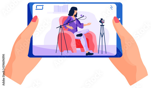 The girl is watching the video from her phone. Female character on video is recording a new song on camera. A woman sits in a red armchair singing and streaming it on camera vector illustration