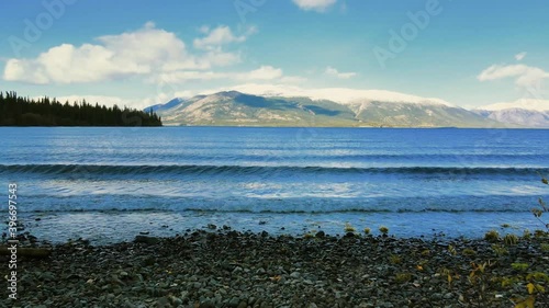 Wallpaper Mural Scenic view of lake Atlin with white peak mountain in background  Torontodigital.ca