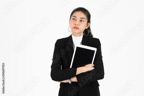 Confident young Asian business woman holding digital tablet for her work over white isolated background.