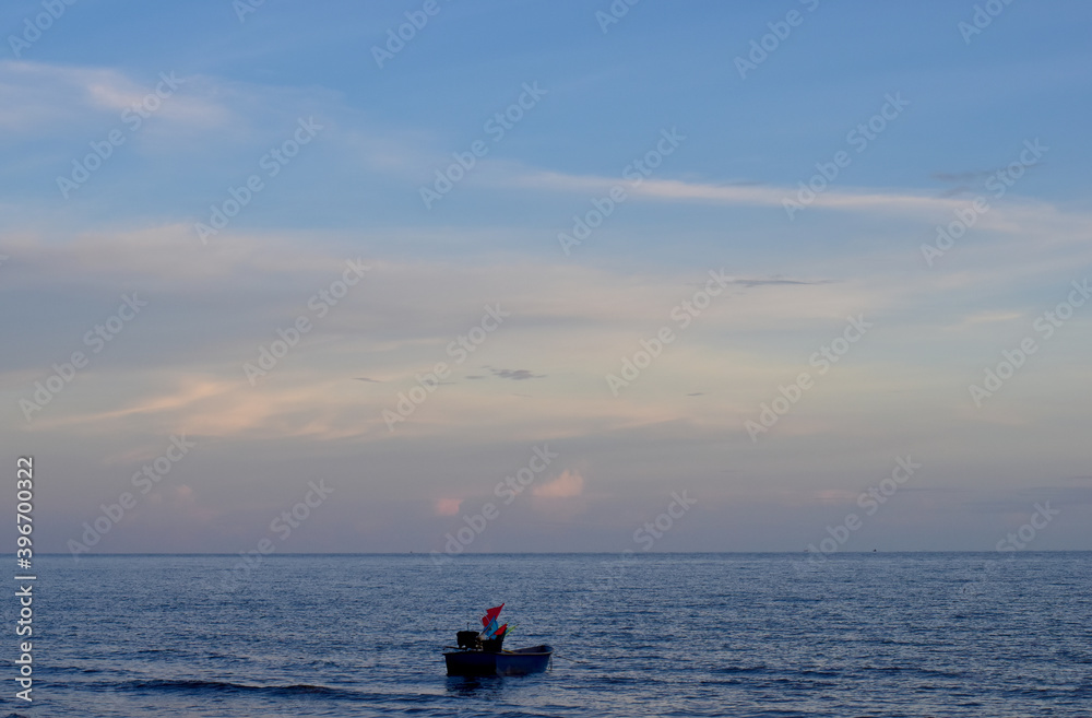 Naklejka premium Beautiful Colorful Ocean Beach and blue sky as the background in Thailand.
