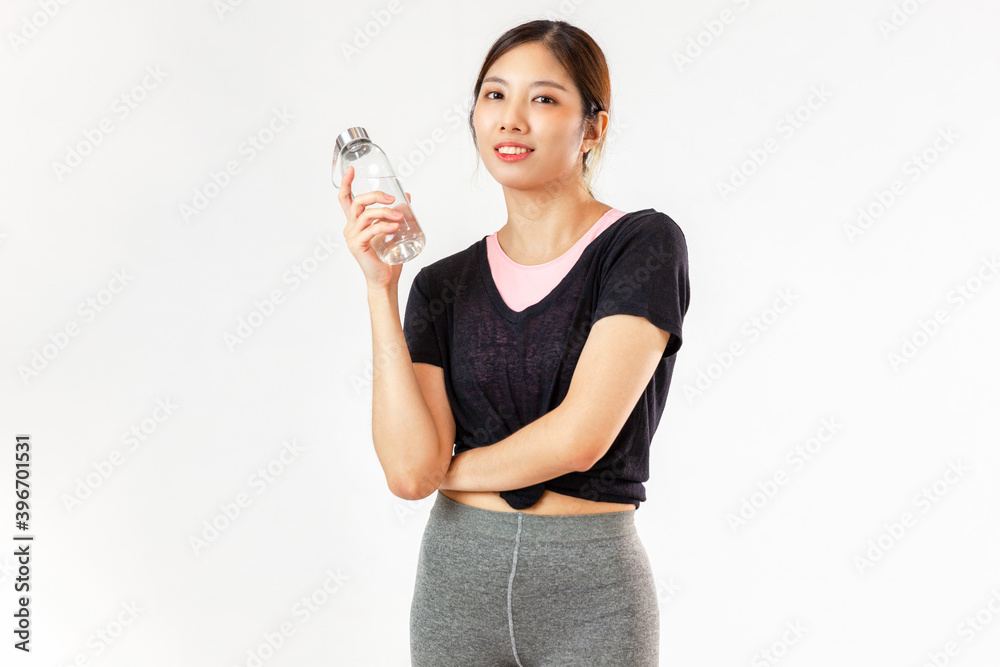 Asia woman standing with smile on white background holding water bottle
Asia woman standing with smile on white background holding water bottle