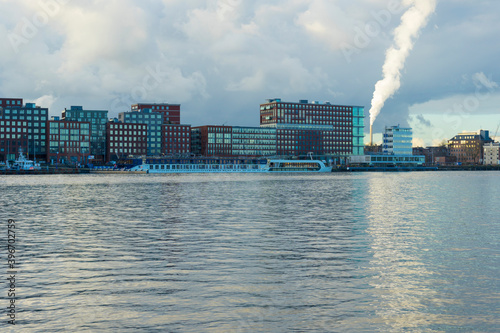 Landscape view of Amsterdam, Gerechtshof Amsterdam building and the harbor named Het IJ in Amsterdam, Netherlands photo
