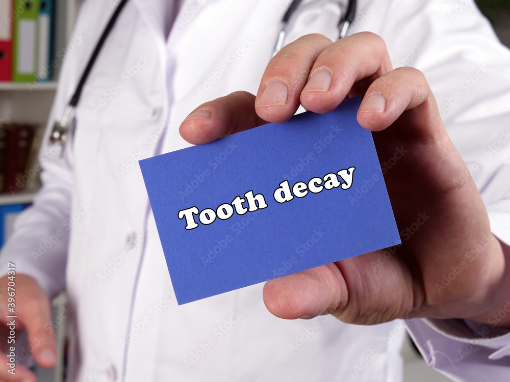 Health care concept about Tooth decay with phrase on the sheet. Health care concept about Tooth decay with phrase on the sheet.