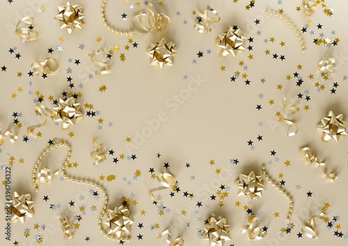 Christmas background . New Year decorations in gold colors frame on gold back...