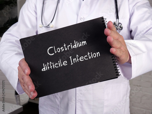 Medical concept meaning Clostridium difficile Infection with phrase on the piece of paper. photo