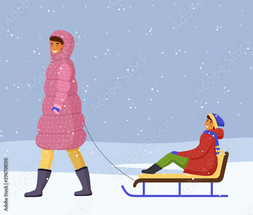 Woman in pink warm down jacket and boots rides girl in red warm jacket, scarf on sled. Snowflakes, snowfall, winter time. Games on the fresh frosty air. Mom and daughter. White snow background