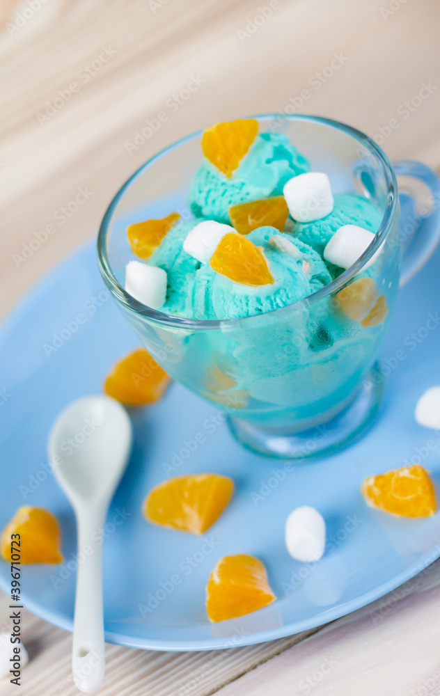 blue ice cream flavored with curacao syrup, citrus pieces and marshmallows blue ice cream flavored with curacao syrup, citrus pieces and marshmallows