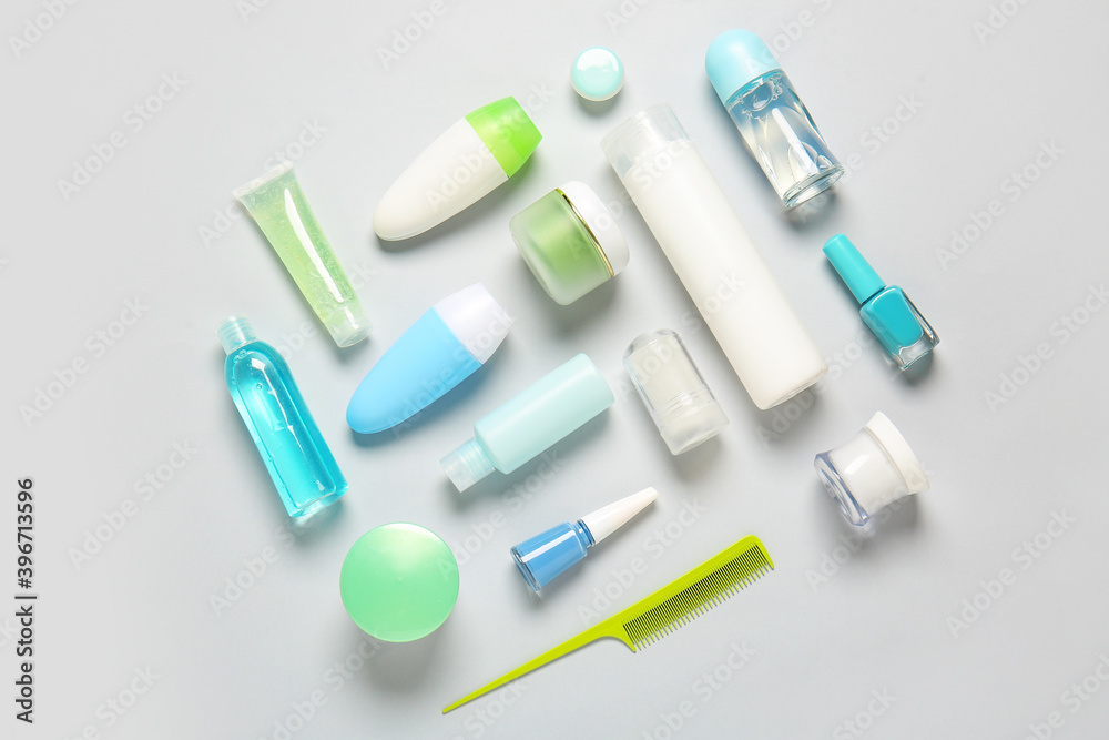 Travel cosmetics kit on light background